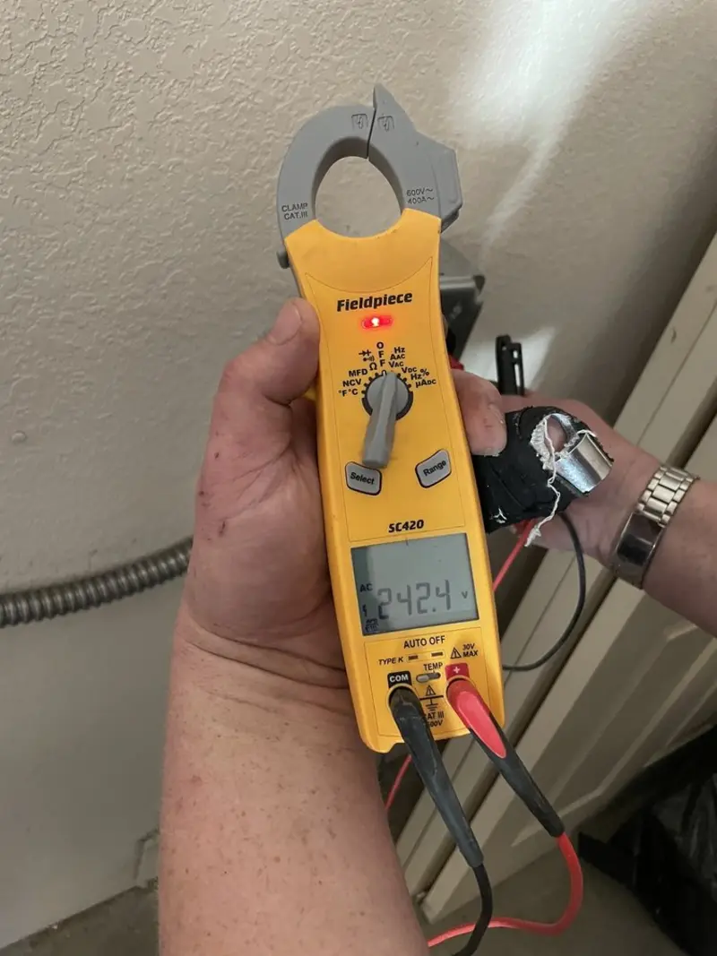 Voltage testing with clamp meter during Generator Installation in Vernon